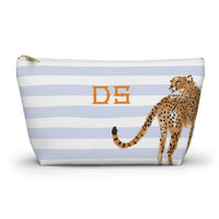 A striped cosmetic bag with a cheetah illustration and the initials "DS" printed on it.